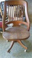 OLD WOODEN ROLLING CHAIR ** LITTLE UNSTURDY