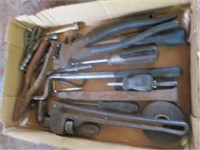 12" pipe wrench, fence pliers, clutch adjusting