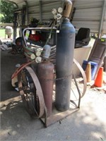 Oxygen/acetylene tanks, hoses, gauges, cart