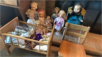 Assorted dolls, children’s chairs, baby bed,