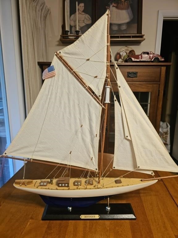 Wooden model Defender Yacht. Sail boat is 21.5"