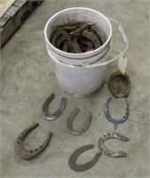 Bucket of Horse Shoes