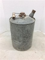 older galvanized hazardous liquids container