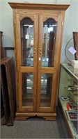 Lighted display cabinet with glass doors and