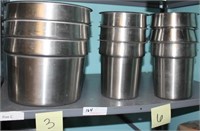 Shelf lot:9 round stainless steel cans-3 lg & 6 sm