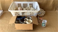 COLLECTORS STEINS AND GLASSES IN LAUNDRY BASKET
