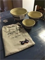 3 Roseville nesting mixing bowls and an onion bag
