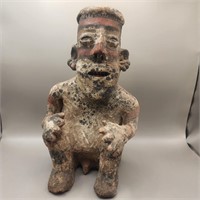 Pre-Columbian painted sitting man w/ showing teeth