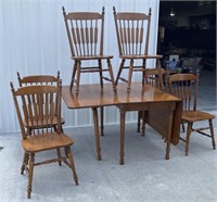 Dinning room table 6 chairs and xtra leaf