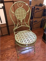 Wrought iron chair, soft green color