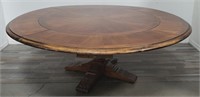 Round dining table with 4 clip-in leaves