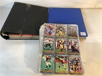 APPROX. 1,100  ASSORTED FOOTBALL CARDS 2 BINDERS