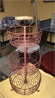 Metal three-tier fruit basket with the center