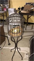Metal decorative birdcage with Byrd finial in a