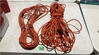 2 large orange extension cords