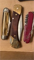 Group of (3) older folding multitools / knives,