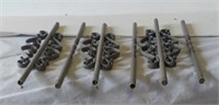 Metal spindles, quantity unknown.