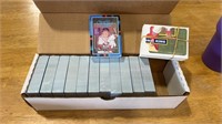 Box of Baseball cards and puzzles  cards are