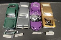 Group of four plastic models. Includes a 1968