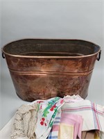 Copper boiler and assorted linens