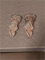 Pair of cherub wall pocket vases made by ardalt