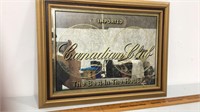 Canadian club “best in the house” mirrored signs.