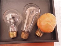 Three vintage light bulbs: Aerolux figural;