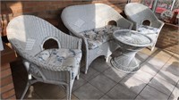 Four piece white wicker furniture