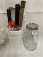 Set of kitchen knives and other kitchen utensils