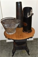 Cast iron 3 legged stove with wood top and 2 ash c
