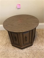 Round top end table with octagon sides with door