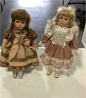 3 dolls on stands