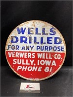Wells Drilled Metal Sign