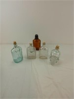 ASSORTMENT OF GLASS BOTTLES