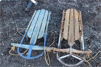 2 antique steel rail sleds