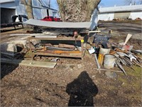 group of scrap metal with work table that has (2)