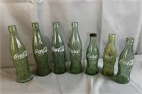 8 Vintage Coco Cola Bottles