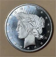 .999 1 OZ SILVER STRIKE. PEACE MOTIF