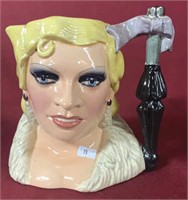 ROYAL DOULTON HAND CREATED “MAE WEST” STEIN.