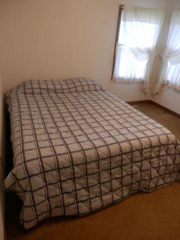 Queen Size bed on platform base includes plaid