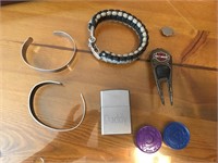 Variety of Items, bracelets, lighter, etc...