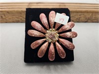 ENAMEL LIKE BROOCH IN LIGHT RED WITH CENTRE