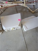 Toilet tank with lid and another lid