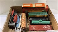 HO scale train cars with extras including cars,