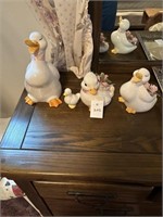 4 duck figurines