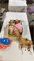 Dolls and horse and blow up pool accessories