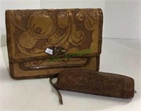Vintage leather pocketbook with hammered pattern