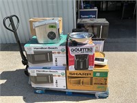 Pallet of microwave ovens, ice machine…