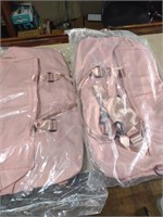 2 large pink duffle bags
