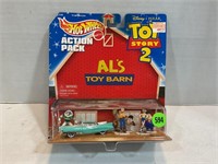 Hot wheels, action pack toy story, two Al’s toy